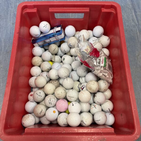 Mixed lot of used golf balls with new Srixon AD333 pack.