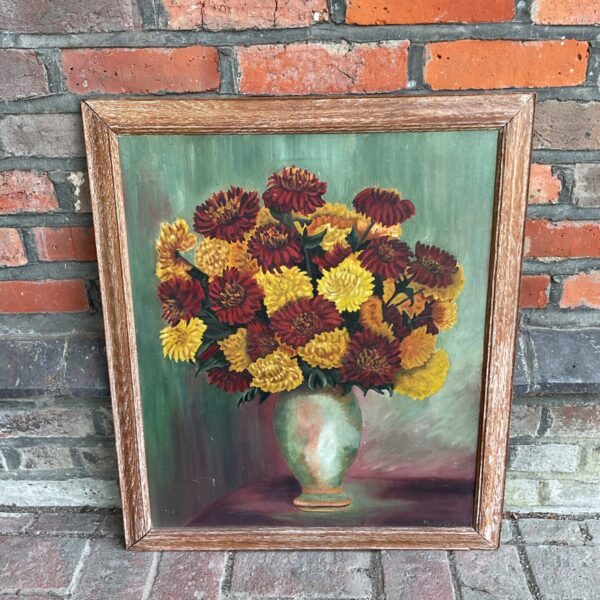 Vintage Phyllis Stott still life painting of red and yellow flowers.