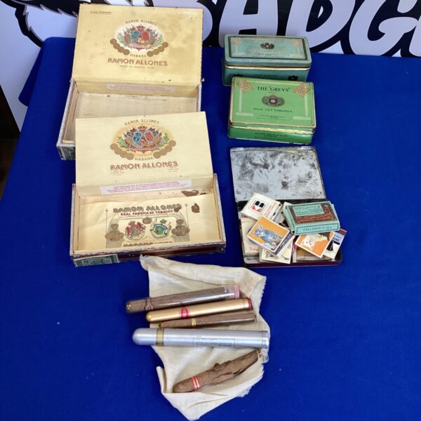 Vintage Ramon Allones cigar boxes and antique tobacco tins collection.
