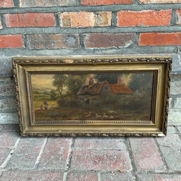 19th-century oil painting of a cottage with geese in a gilt frame.