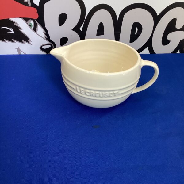 Vintage Le Creuset batter bowl with handle and pouring lip.