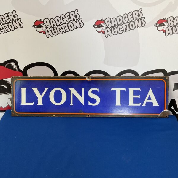 Vintage Lyons Tea enamel sign, a classic advertising piece.