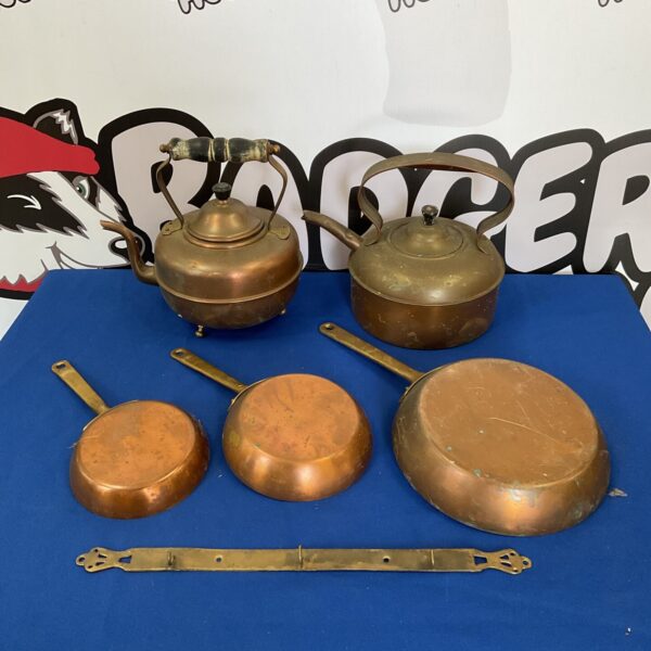 Vintage copper kettle and pans, antique kitchenware collection.