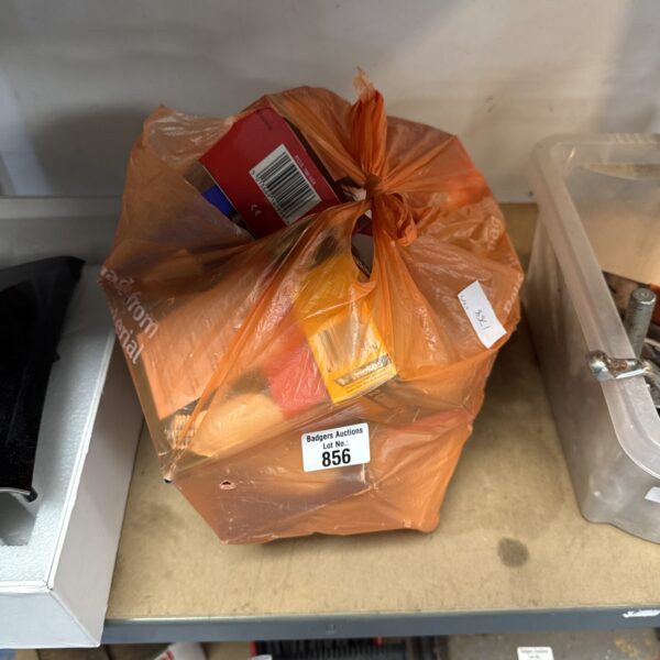 Clear plastic bag filled with assorted new light bulbs.