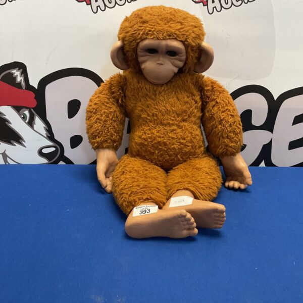Vintage Monchhichi chimpanzee doll, a collectible plush toy.