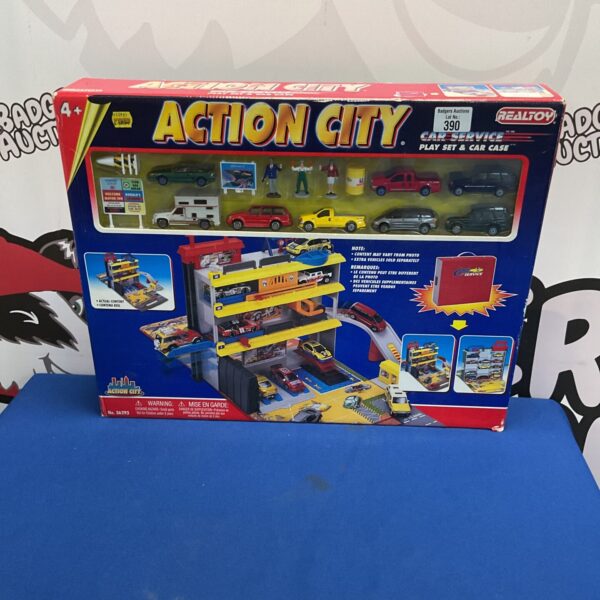 Vintage Realtoy Action City car service playset with diecast cars.
