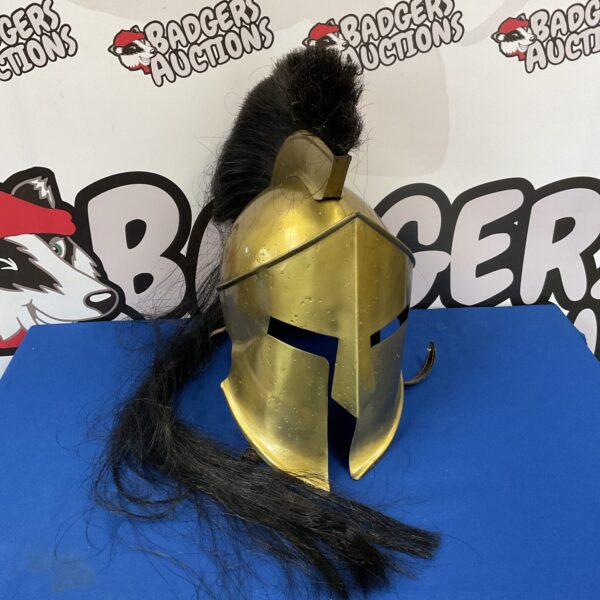 Detailed replica Roman gladiator helmet with crest.