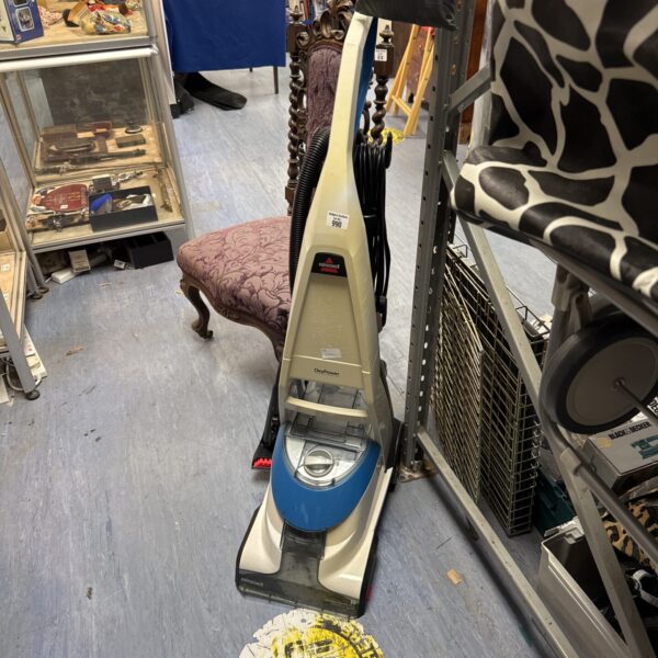 Vintage Bissell Oxypower carpet cleaner in used condition.