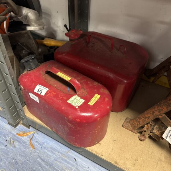 Vintage red metal fuel can, a collectible item for enthusiasts.