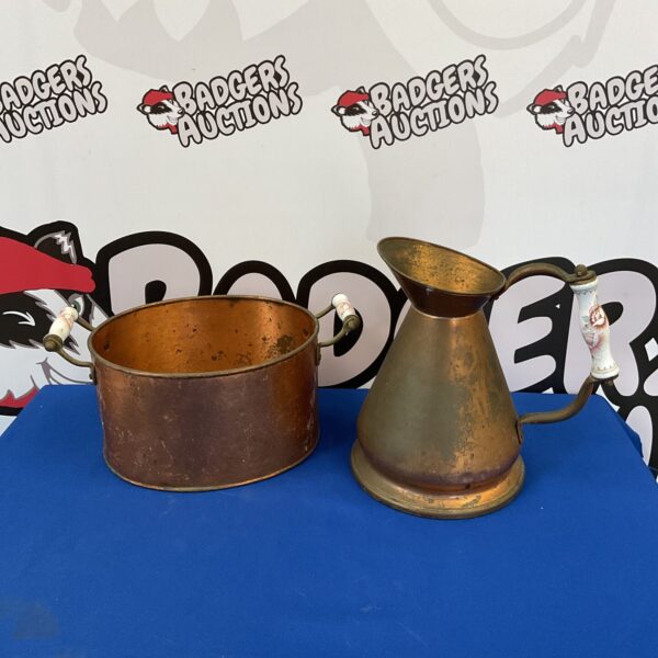 Vintage copper pot and jug with ceramic handles, rustic kitchenalia.