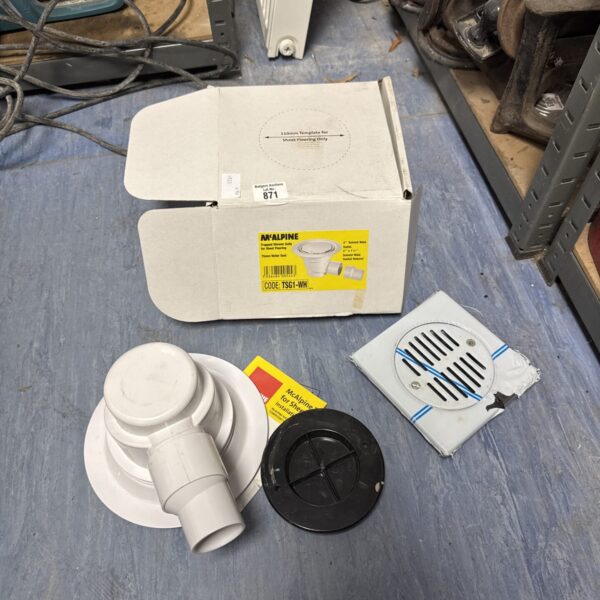 Used Mcalpine shower gully for bathroom floor drainage.