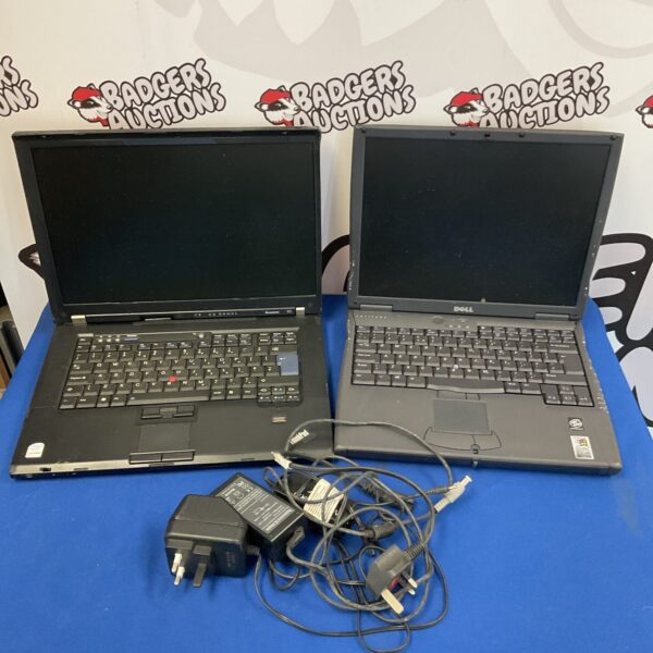 Vintage laptop pair including IBM Thinkpad and Dell Latitude.