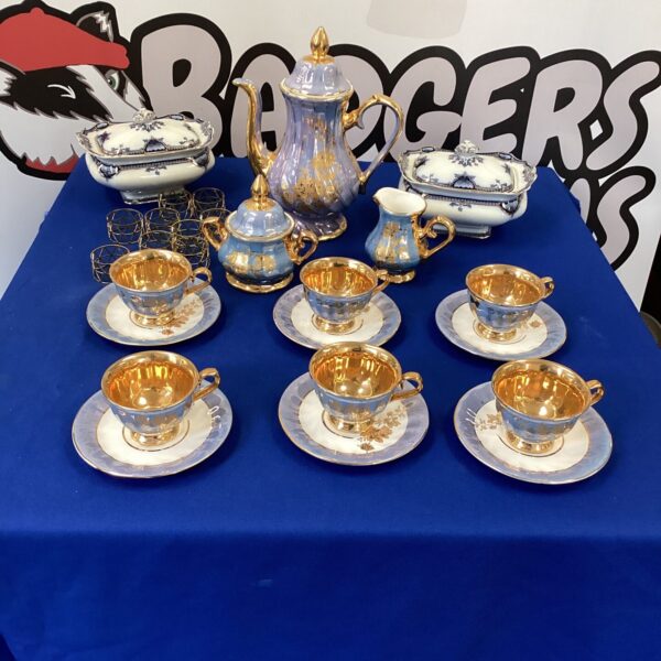 Vintage Bavaria tea set with gold accents and floral patterns.