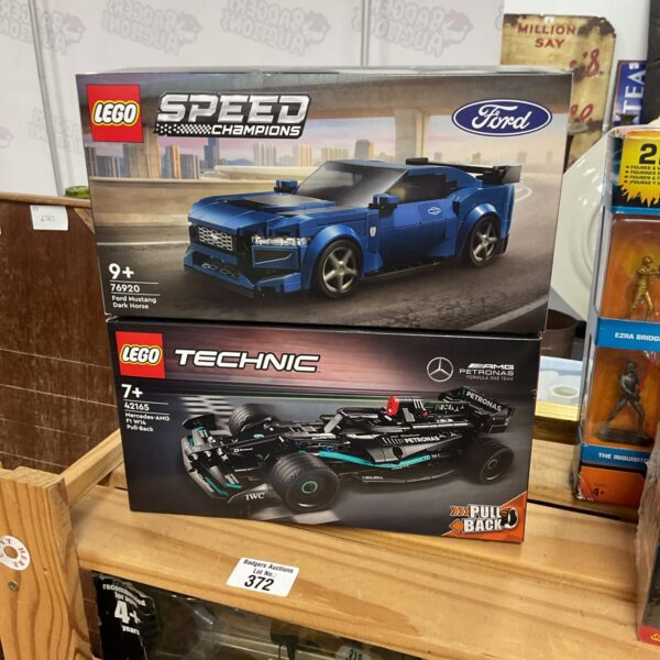 LEGO Speed Champions and Technic sets in original packaging.