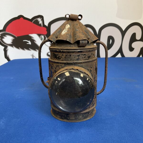 Vintage Great Northern Railway signal lamp with clear glass.