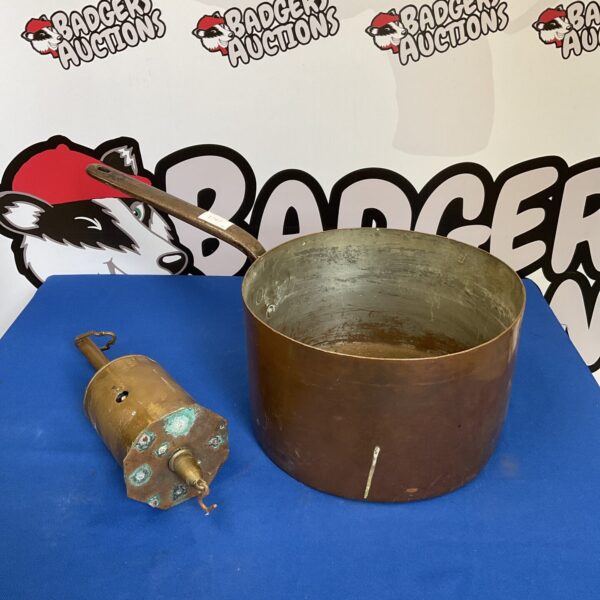 Large antique copper rotisserie pan with brass mechanism.