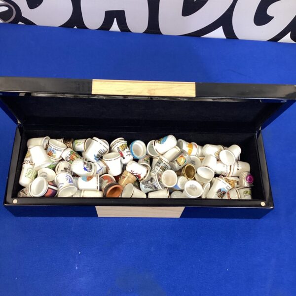 Large lot of vintage china thimbles for collectors.