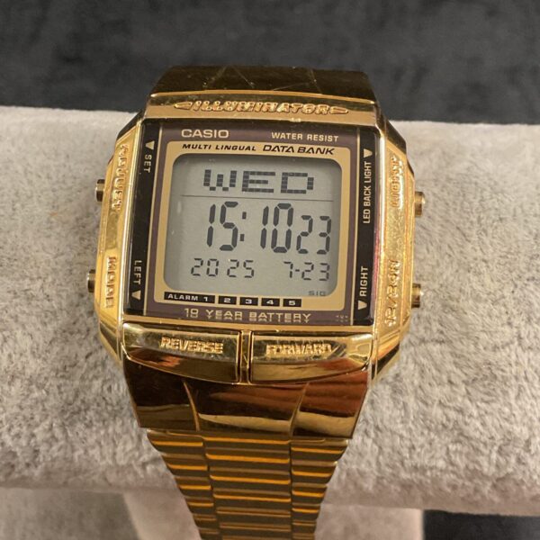 Vintage Casio digital gilt watch with gold case and bracelet.