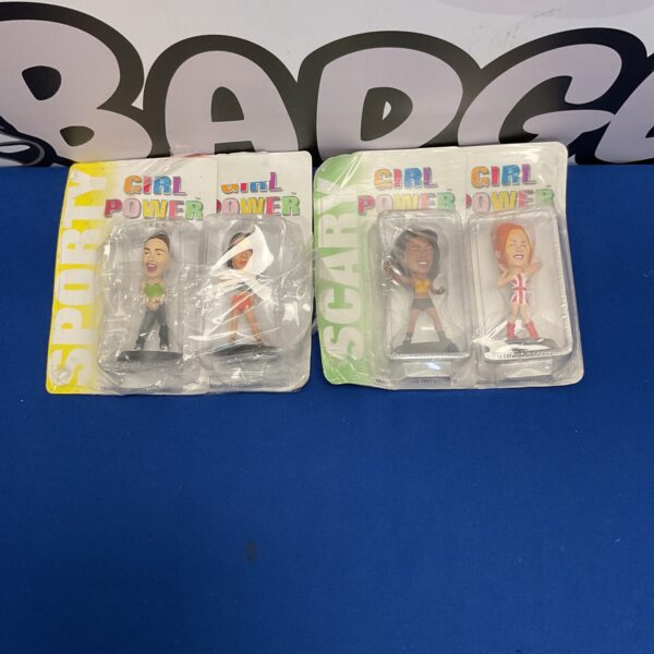 Vintage Girl Power figures representing the Spice Girls.