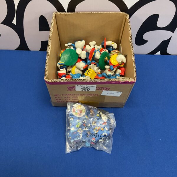 Vintage McDonald's Smurf figures in a mixed lot, collectible toys.