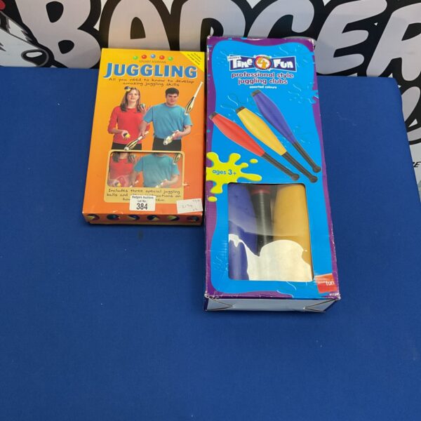 Brightly coloured Time4Fun professional juggling clubs set.