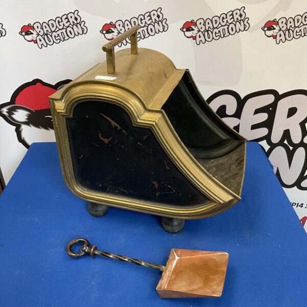 Vintage brass coal scuttle with copper shovel for fireplace use.
