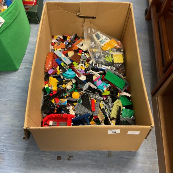 Large mixed Lego lot with colourful building bricks.