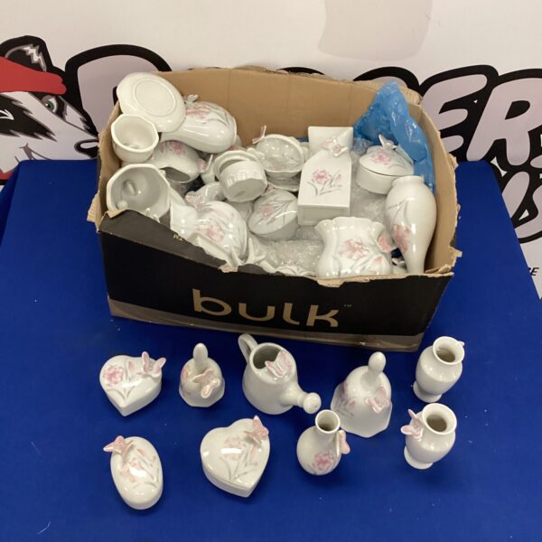 Large lot of vintage white porcelain ornaments and vases.