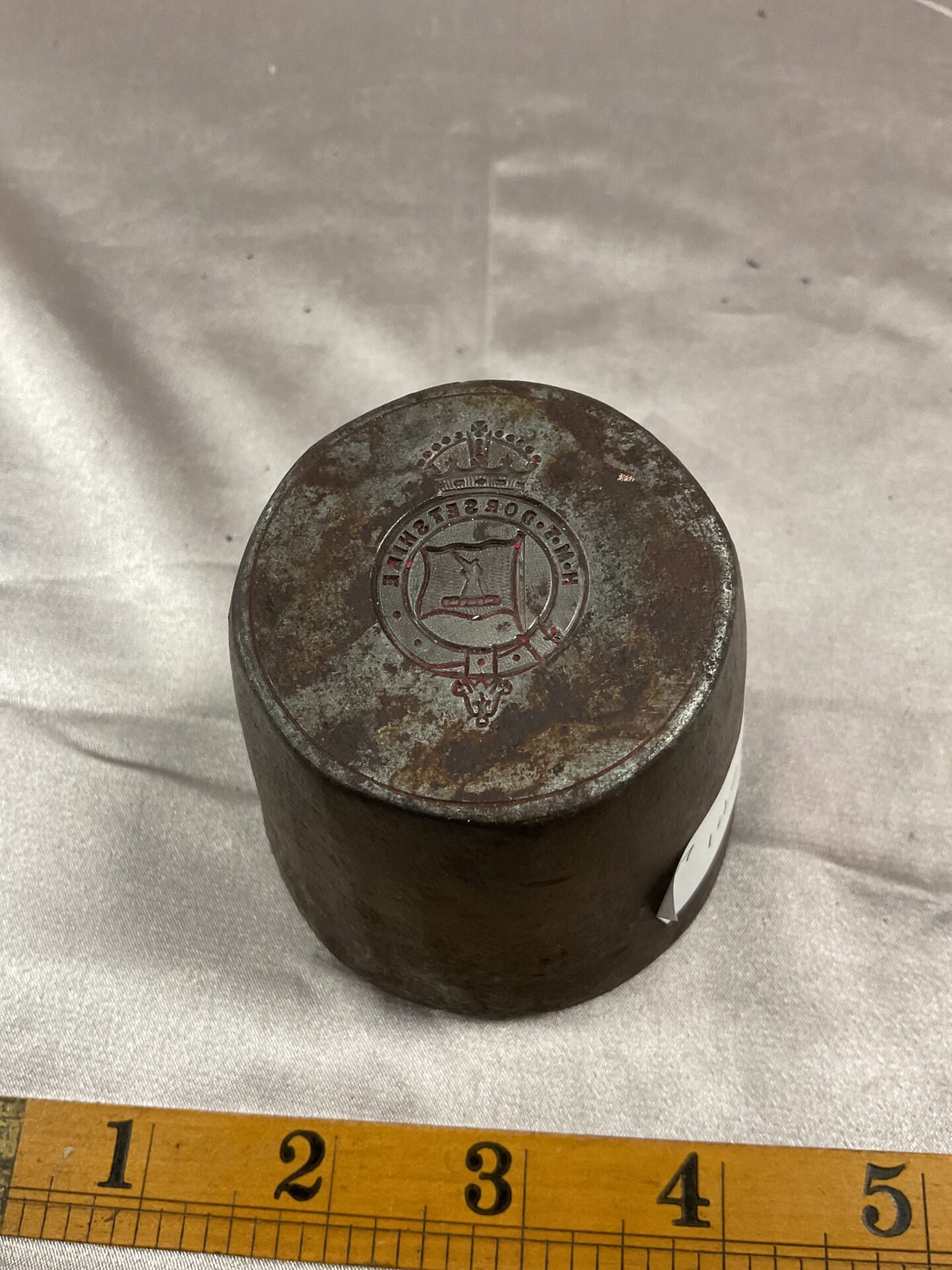 729 Antique Cast iron H M T Dorsetshire Button die