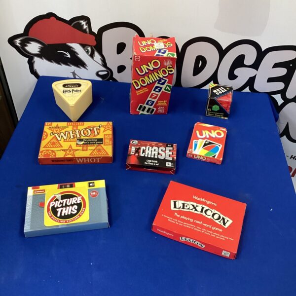Selection of board games including Uno and Harry Potter Trivial Pursuit.