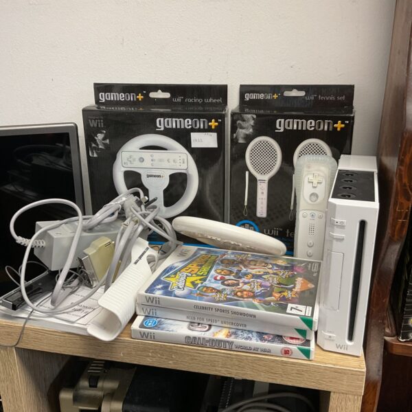 Nintendo Wii console bundle with games and controller displayed.