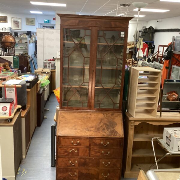 Antique Regency mahogany bureau bookcase with astragal glazing.