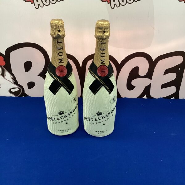 Two bottles of Moet & Chandon Champagne with cooling jackets.