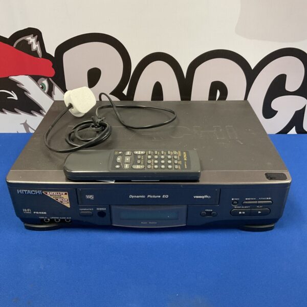 Vintage Hitachi F645E VHS recorder with remote control.