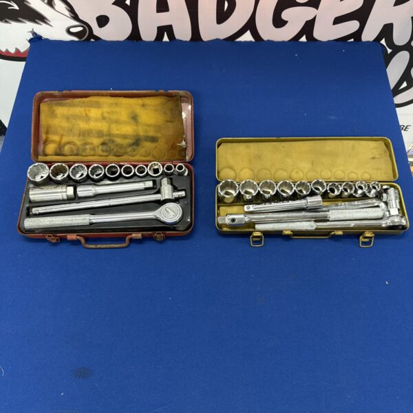 Vintage ratchet and socket set in wooden case, classic mechanic's tools.