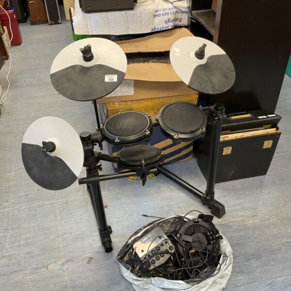 Used Alesis Debut electronic drum kit with pads and module.