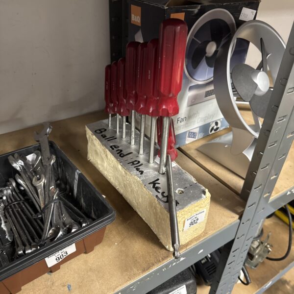 Close-up of a used ball end Allen key set in original packaging.