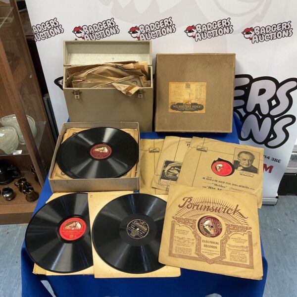 Vintage gramophone records in original sleeves, a collectible record collection.