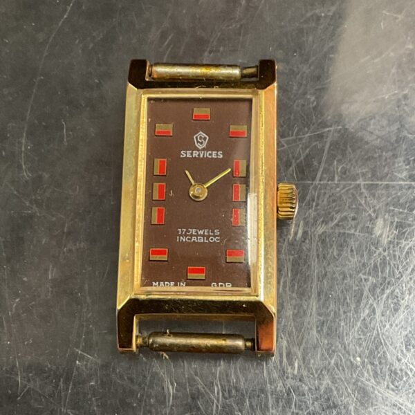 Vintage Services ladies wristwatch with 14k gold case.