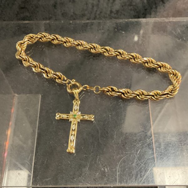 9ct gold bracelet with green stone cross pendant.