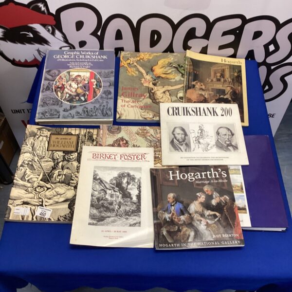 Vintage art book collection featuring Hogarth, Gillray, and Cruikshank.