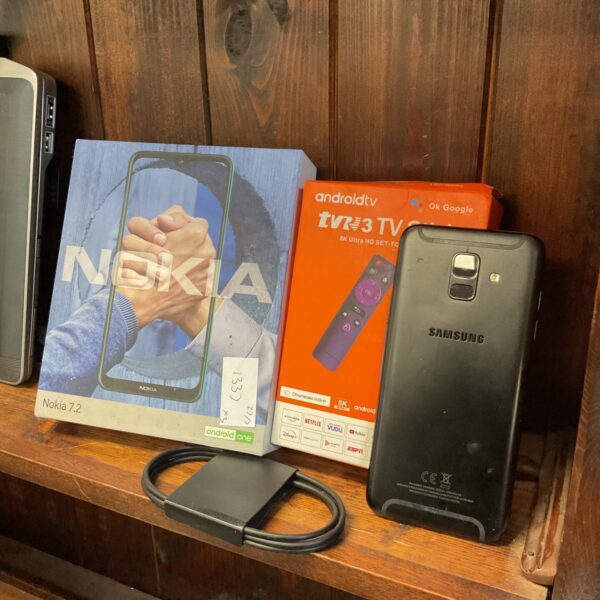 Nokia 7.2 smartphone, Android TV stick, and Samsung Galaxy phone lot.