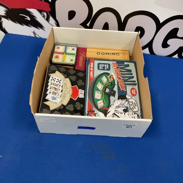 Mixed lot of vintage board games including dominoes and playing cards.