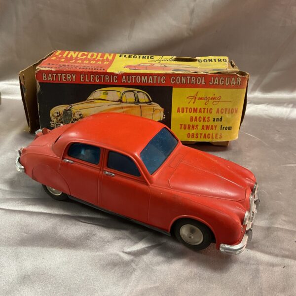 Vintage Lincoln 2.4 Mk1 Jaguar electric model car, side view.