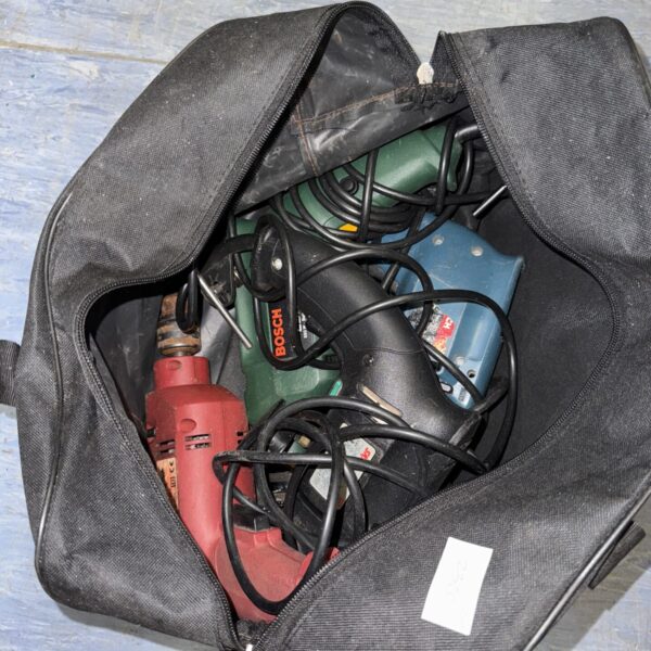 Assorted power drills in a bag, including a Bosch drill.