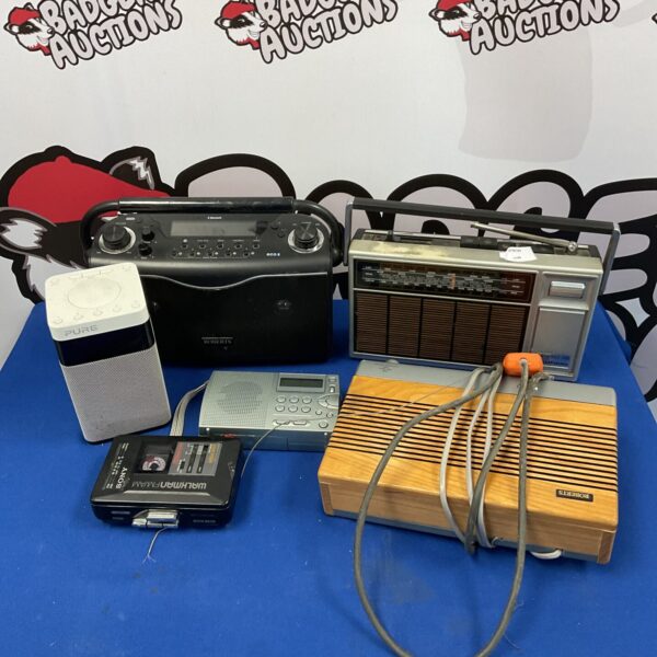 Vintage radio lot featuring a Sony Walkman cassette player.