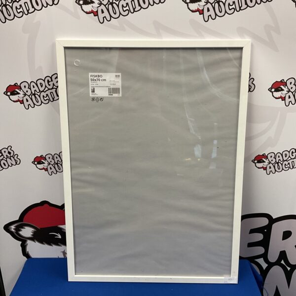 Black Ikea Fiskbo 50x70 picture frame for wall display.