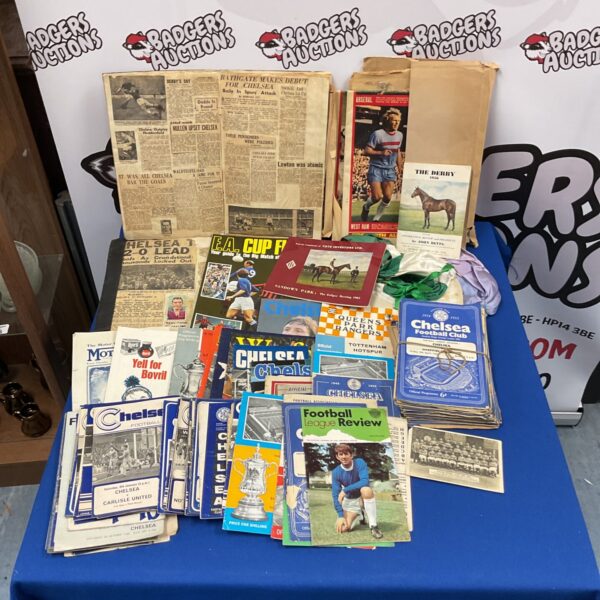 Vintage Chelsea football programs and scrapbook collection for collectors.