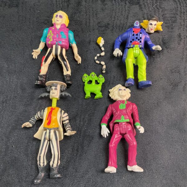 Vintage Beetlejuice Kenner figures from 1989, collectible toys.