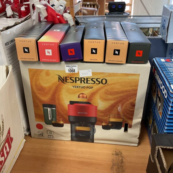 Nespresso Vertuo Pop coffee machine in original packaging with pods.